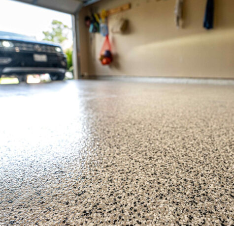 Garage epoxy flooring with flakes and polyaspartic top coat